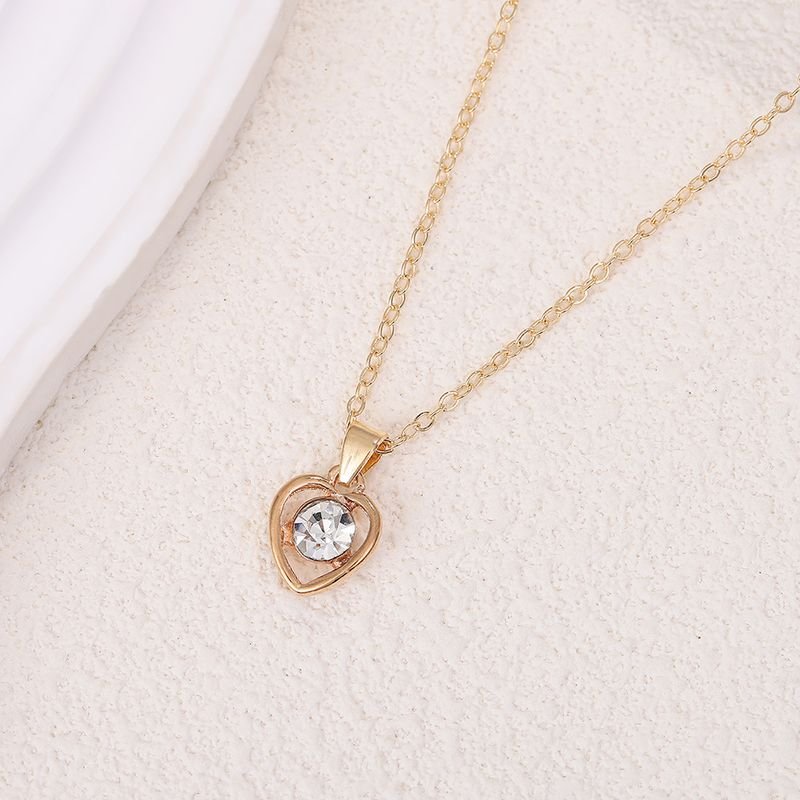 Women Simple Fashion Heart-Shaped Rhinestone Necklace Earrings Ring Bracelet Four-Piece Set