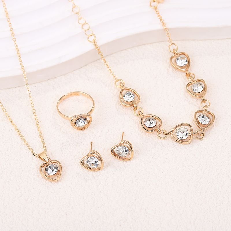 Women Simple Fashion Heart-Shaped Rhinestone Necklace Earrings Ring Bracelet Four-Piece Set